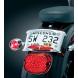 CURVED LICENSE PLATE FRAME WITH RUN-TURN-BRAKE