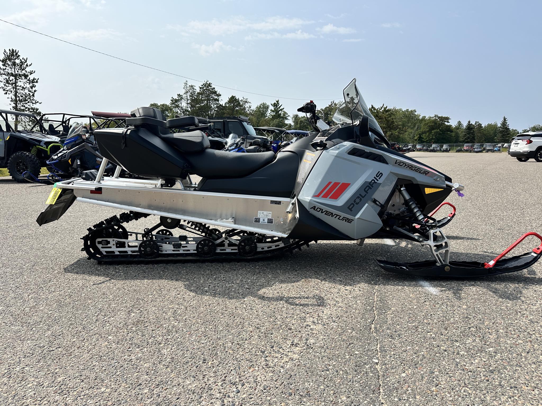 2024 Polaris 550 VOYAGEUR ADVENTURE 144 ES - GRY/RED-RAW-RAW-STD - Photo 6