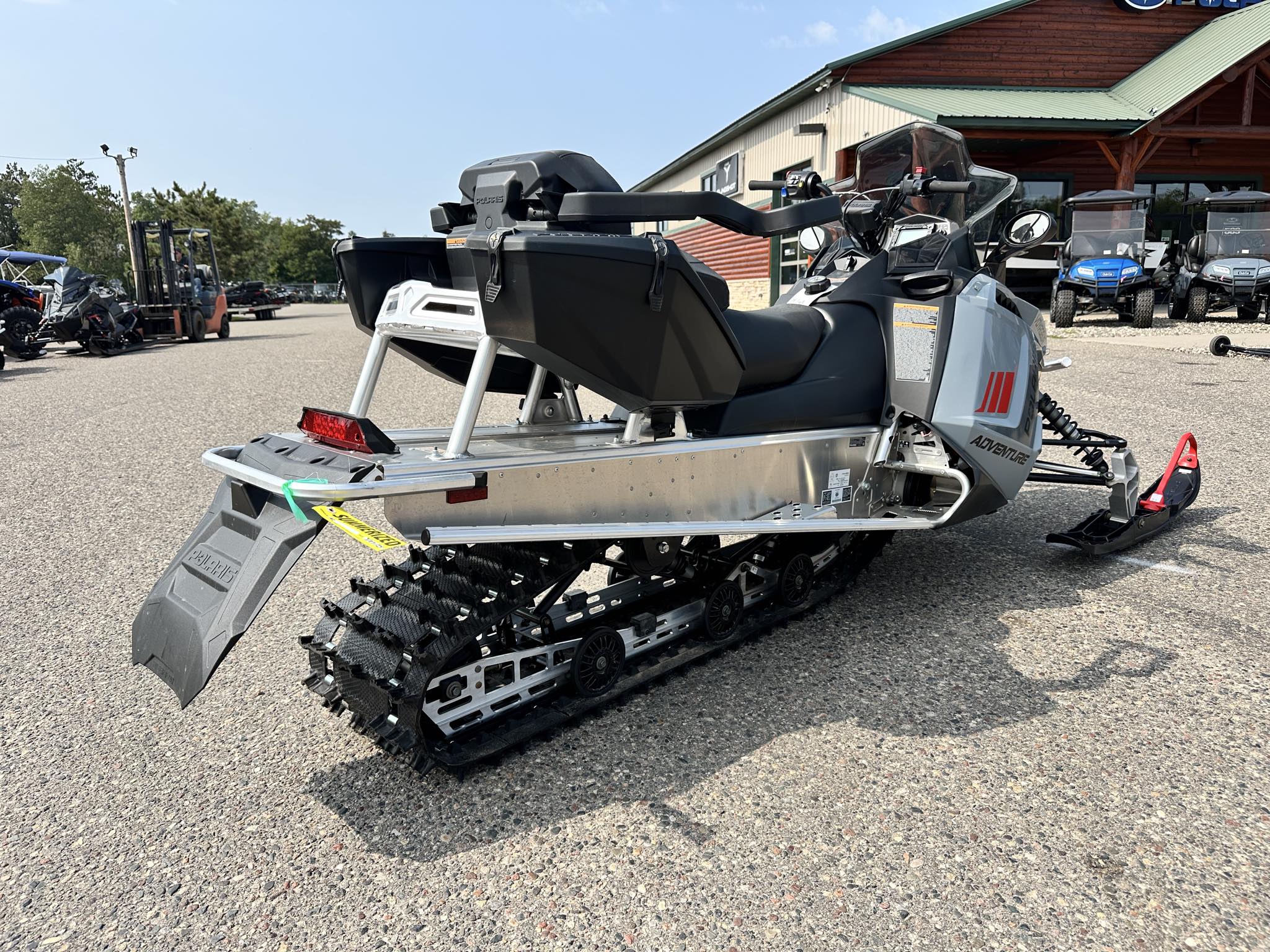 2024 Polaris 550 VOYAGEUR ADVENTURE 144 ES - GRY/RED-RAW-RAW-STD - Photo 9
