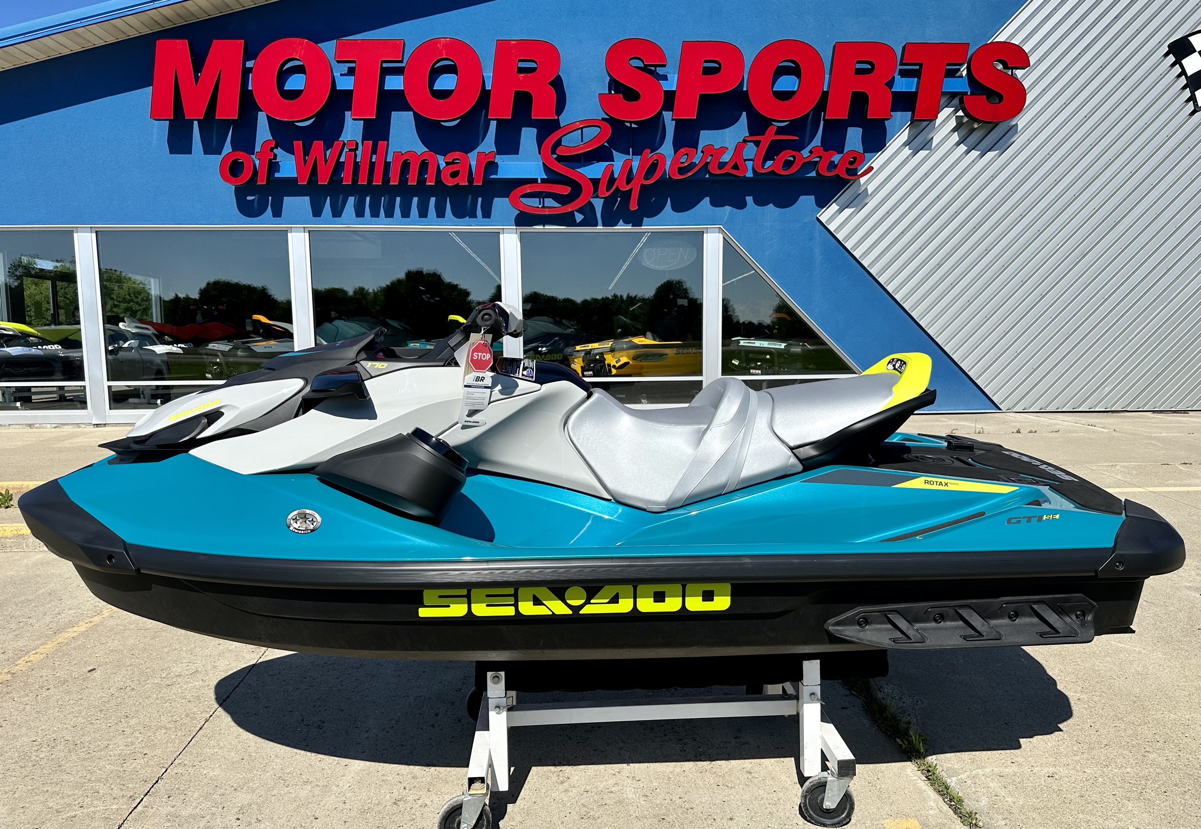2026 Sea-Doo GTI SE 130 Tech Package with Audio iDF and iBR in Teal Blue - Manta Green — front three-quarter view