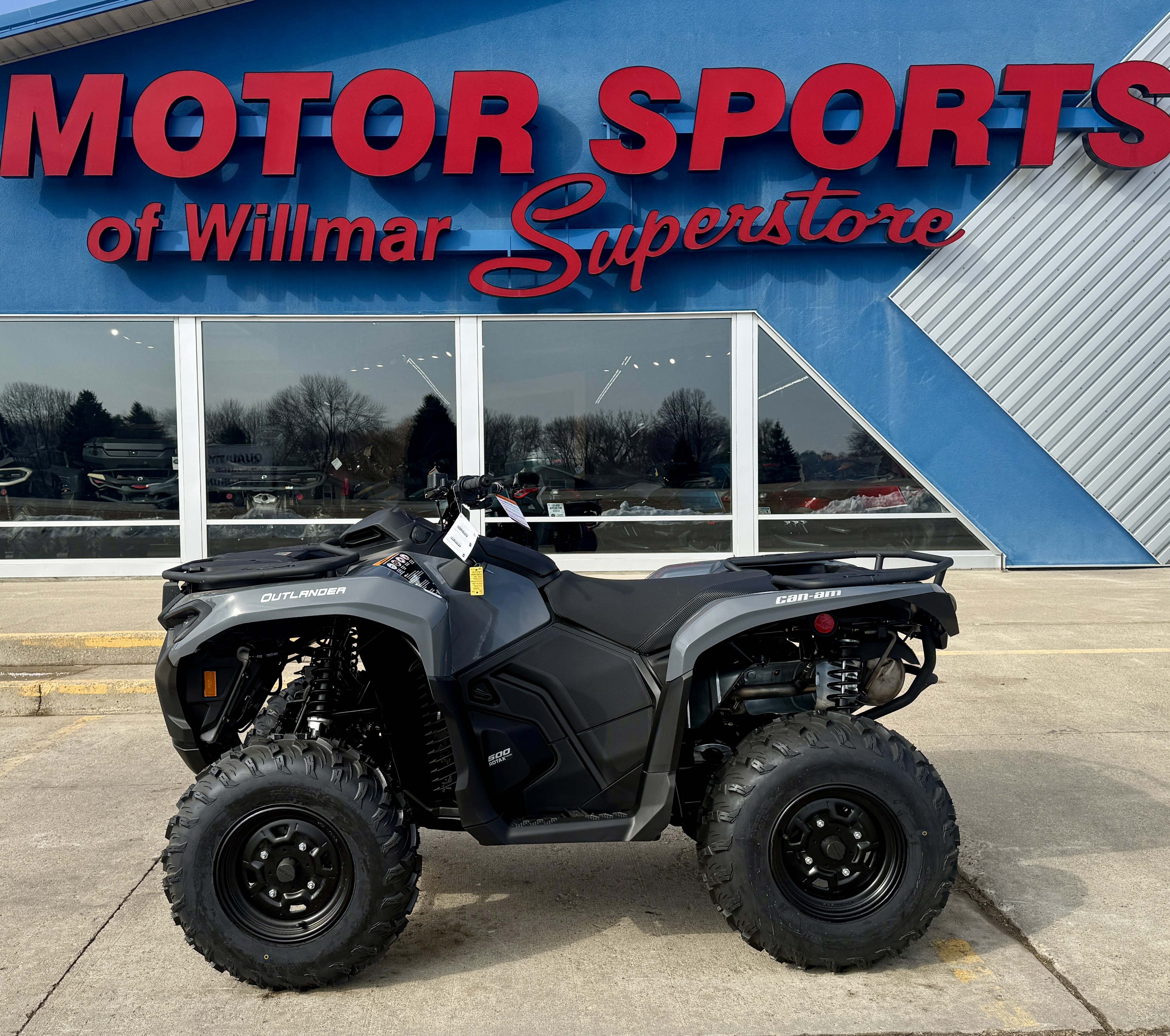 2026 Can-Am Outlander DPS 700 in GRANITE GRAY — front three-quarter view